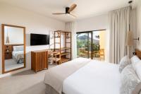 Postel nebo postele na pokoji v ubytování Playa Surf CBbC Hotel