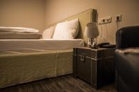 Posteľ alebo postele v izbe v ubytovaní THOMSN Central Hotel & Appartements