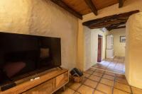 A television and/or entertainment centre at Casa El Barranco