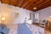 A bed or beds in a room at Casa El Barranco