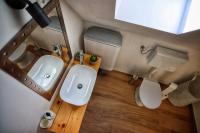 an overhead view of a bathroom with two sinks and a toilet at Kuća za odmor Miracool in Generalski Stol