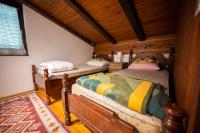a bedroom with two beds in a cabin at Svjetlost in Jahorina