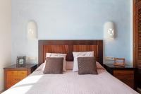 Postel nebo postele na pokoji v ubytování Casa Paradise
