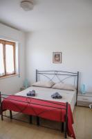 Łóżko lub łóżka w pokoju w obiekcie Residence Sunbeam