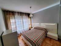 A bed or beds in a room at Casa Porto, con Garaje