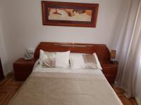 A bed or beds in a room at Casa Porto, con Garaje