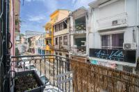 a view from a balcony of a street with buildings at Foyal City Center in Fort-de-France