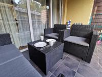 Część wypoczynkowa w obiekcie Wrzosowy Resort Pogorzelica Apartament PERŁOWY Sea&Forest