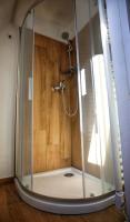 a shower with a glass enclosure in a bathroom at Kuća za odmor Miracool in Generalski Stol