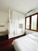Postel nebo postele na pokoji v ubytování Rotinis Hostel