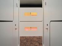 a pair of white garage doors with towels on them at CityHub Amsterdam in Amsterdam