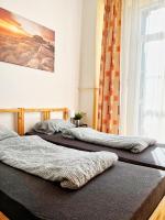 Posteľ alebo postele v izbe v ubytovaní Room in Old Town Krakow