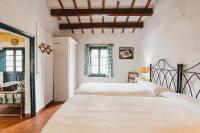 A bed or beds in a room at Agroturismo Son Triay
