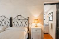 A bed or beds in a room at Agroturismo Son Triay