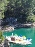 a bunch of boats are docked in the water at Moli l&#39;Abad in Puebla de Benifasar