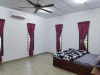 Laman Norras Homestayにあるベッド