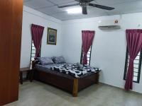 Laman Norras Homestayにあるベッド
