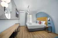 Posteľ alebo postele v izbe v ubytovaní Centro Hotel Ioannina