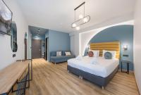 Posteľ alebo postele v izbe v ubytovaní Centro Hotel Ioannina