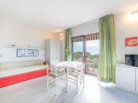 A bed or beds in a room at Apartment Turistica-1 by Interhome