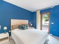 A bed or beds in a room at Apartment Turistica-1 by Interhome
