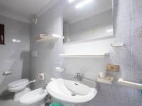 A bathroom at Apartment Turistica-1 by Interhome