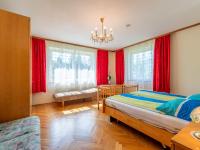 A bed or beds in a room at Apartment Pacher by Interhome