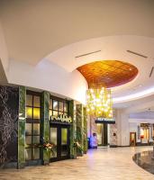 a lobby of a hotel with a chandelier at Walker's Bluff Casino Resort in Carbondale