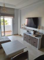 TV a/nebo společenská místnost v ubytování Super appartement avec 5 piscines en résidence
