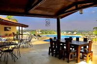 Bazén v ubytování Pink Flamingo Boutique Hotel nebo v jeho okolí