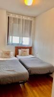 Postel nebo postele na pokoji v ubytování Apartments Madrid Suite Aeropuerto, IFEMA