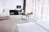 Postel nebo postele na pokoji v ubytování Wellness Hotel Vista