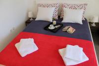 Łóżko lub łóżka w pokoju w obiekcie Apartments PineWood Villa