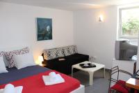 Łóżko lub łóżka w pokoju w obiekcie Apartments PineWood Villa