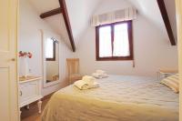 Posteľ alebo postele v izbe v ubytovaní Apartamento Arena Dorada