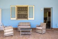 A seating area at La Perla Di Mare - Gemma