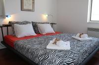 Łóżko lub łóżka w pokoju w obiekcie Apartments PineWood Villa