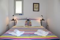 Łóżko lub łóżka w pokoju w obiekcie Apartments PineWood Villa