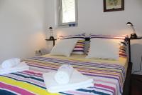 Łóżko lub łóżka w pokoju w obiekcie Apartments PineWood Villa