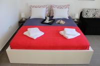Łóżko lub łóżka w pokoju w obiekcie Apartments PineWood Villa