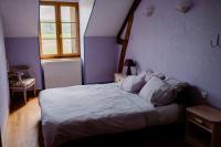 Posteľ alebo postele v izbe v ubytovaní gîte la vannageoise