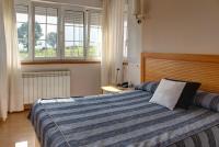 Postel nebo postele na pokoji v ubytování Hotel Mirador del Sella
