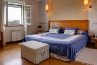 Postel nebo postele na pokoji v ubytování Hotel Mirador del Sella