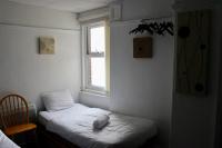 Henson Hotel Pleasure Beachにあるベッド