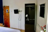 Henson Hotel Pleasure Beachにあるテレビまたはエンターテインメントセンター
