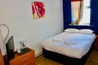 Henson Hotel Pleasure Beachにあるベッド