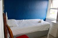 Henson Hotel Pleasure Beachにあるベッド
