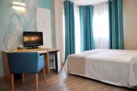 TV a/nebo společenská místnost v ubytování Hotel Castilla Alicante