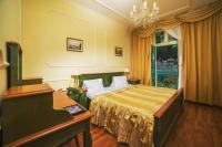 Postel nebo postele na pokoji v ubytování Interhotel Central