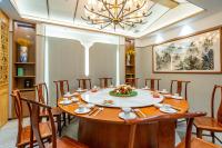 a large dining room with a table and chairs at WAIFIDEN Hotel -Former Tokai Hotel in Guangzhou